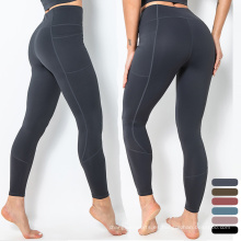 Gimnasio Nuevo color sólido Pantalones de yoga de alta cintura Leggings deportivos deportivos Leggings de fitness elástico con bolsillo